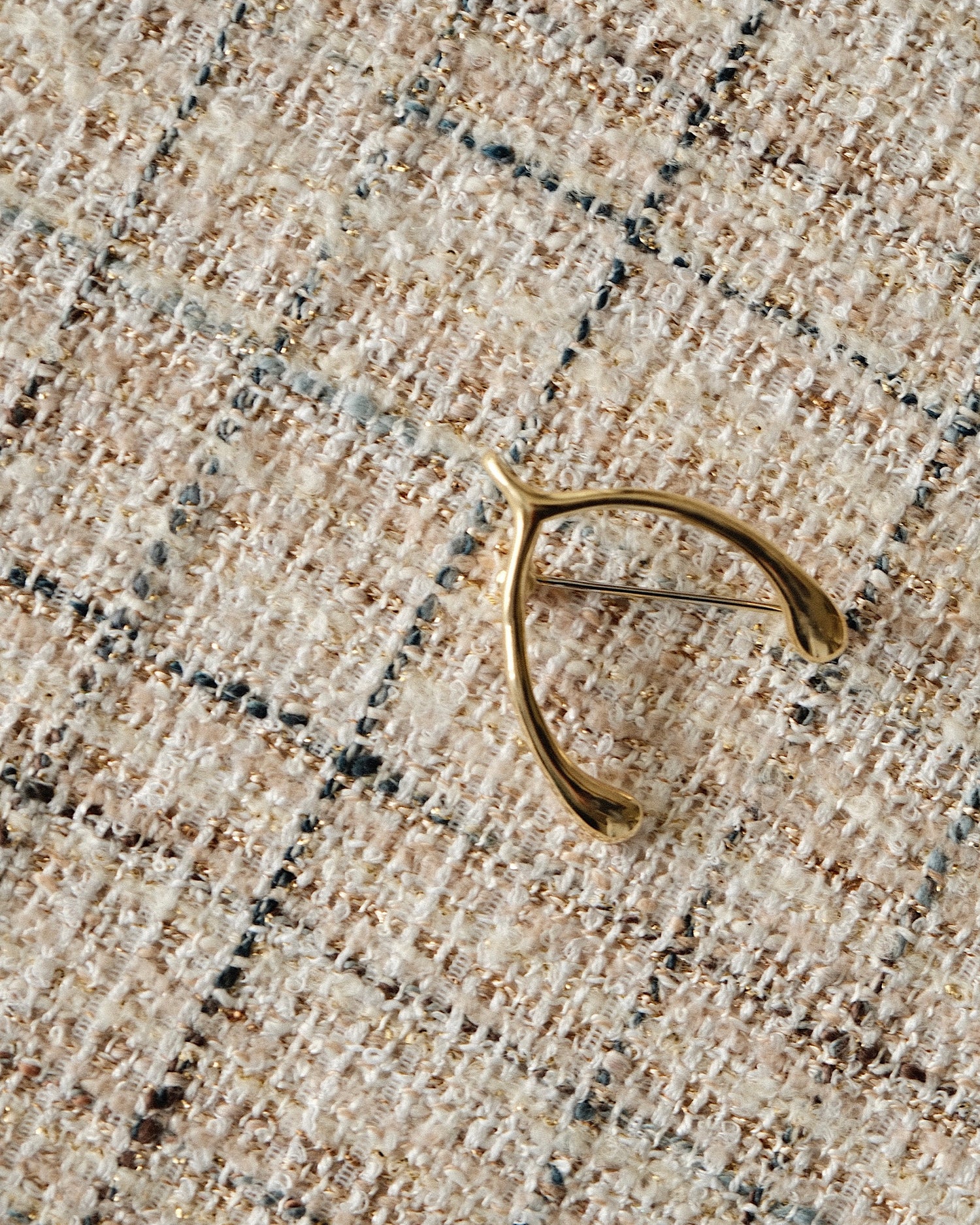 gold wish bone brooch