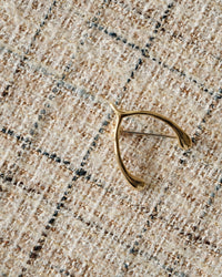 gold wish bone brooch