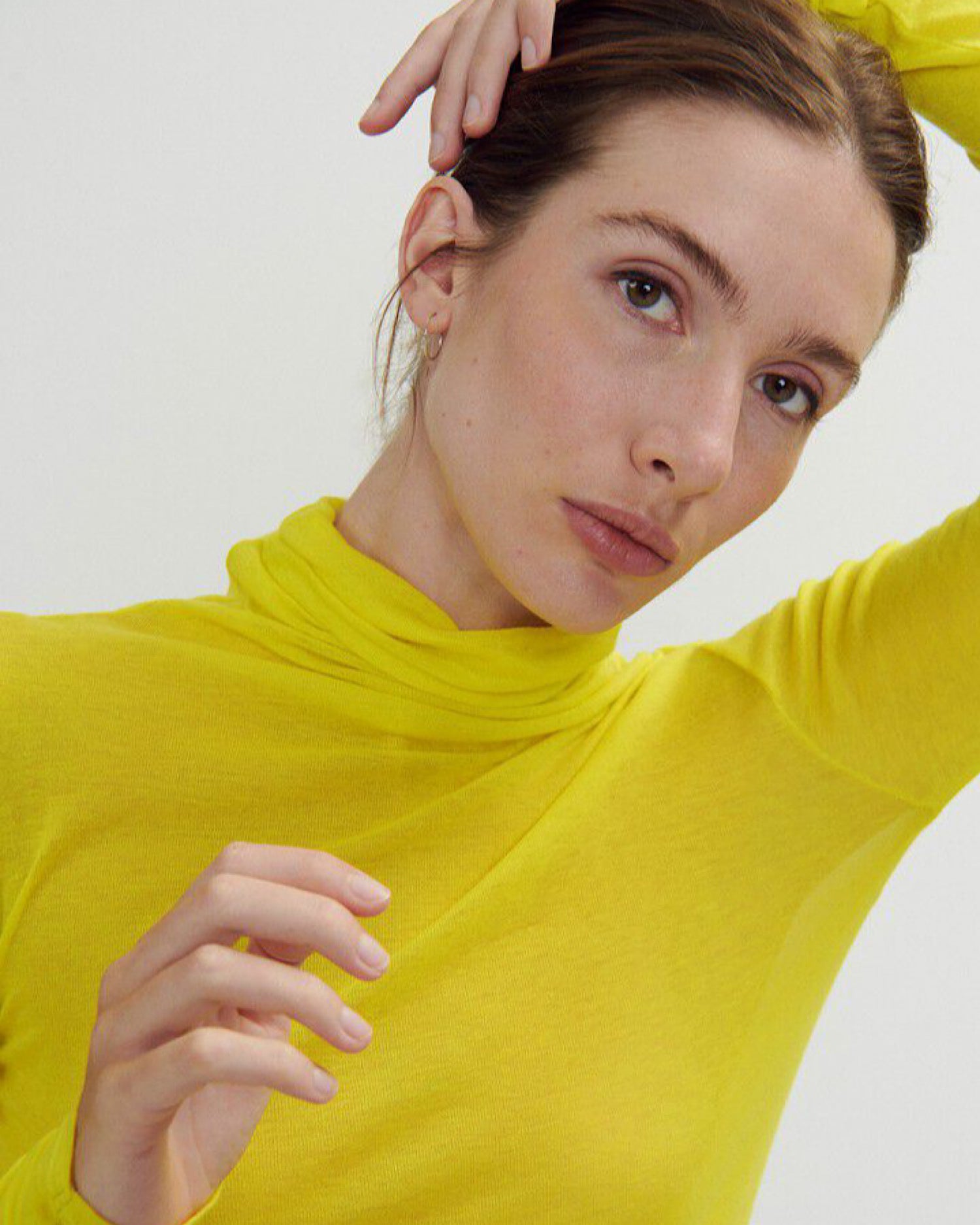 a bright yellow turtleneck