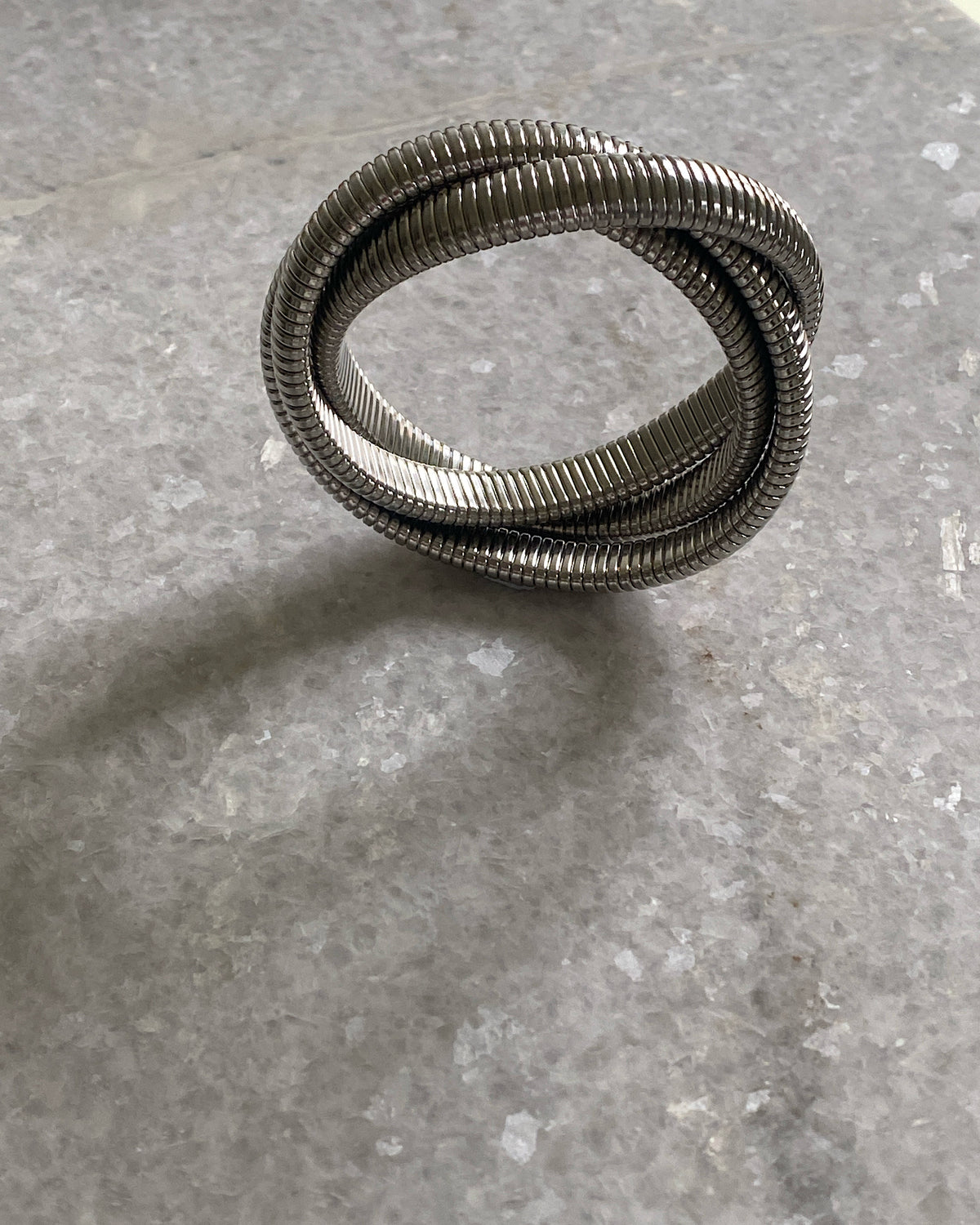 Silver intertwining snake bangle