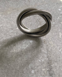 Silver intertwining snake bangle