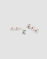 Silver four leaf clover earrings with a central coral stone