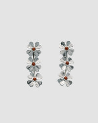 triple four leaf clover silver drop earrings featuring coral