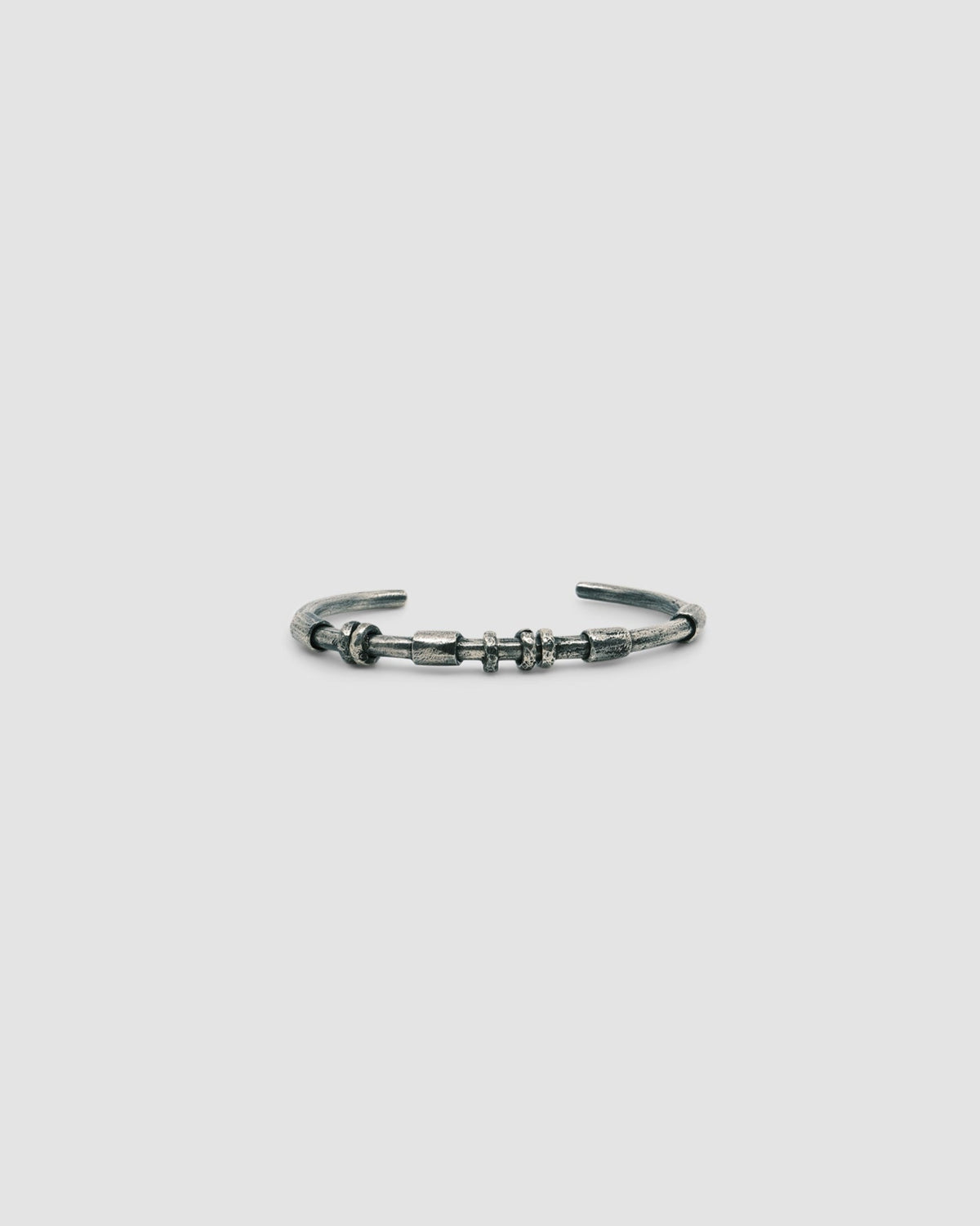 dark blackened silver thin cuff bangle with oval tube silver bead detail