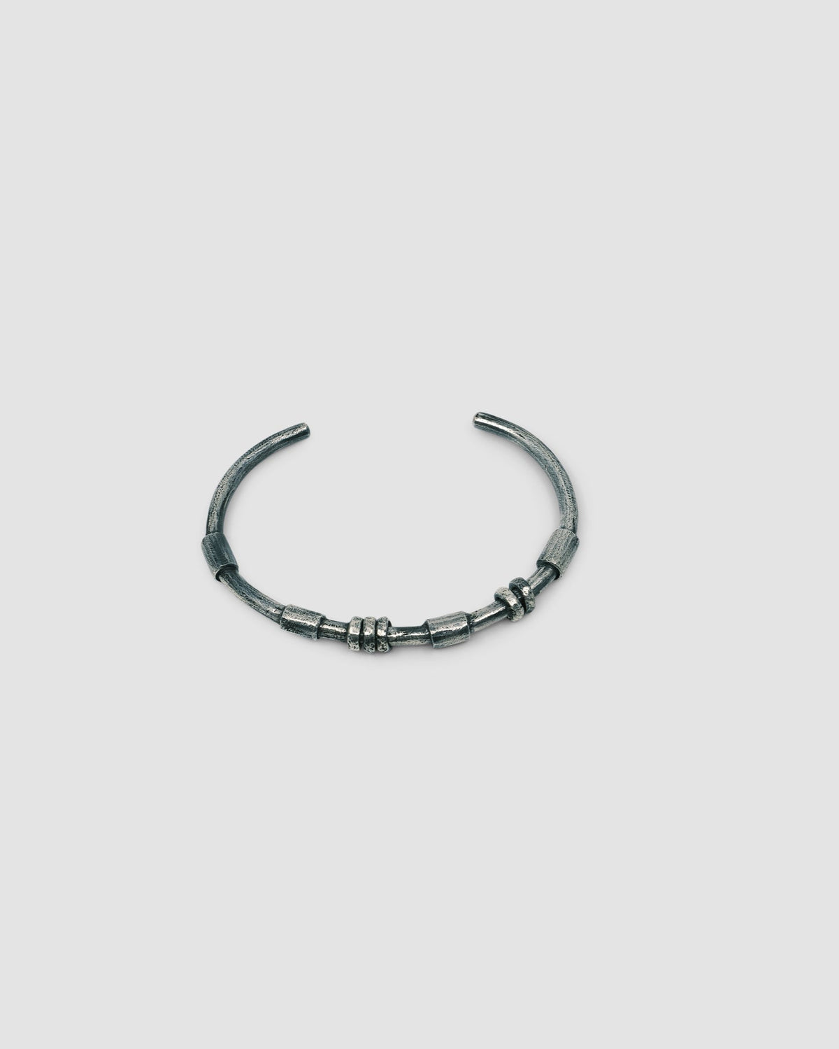 dark blackened silver thin cuff bangle with oval tube silver bead detail