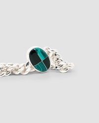 Silver cuban link chain with a chequerboard style inlaid stone which is green & black
