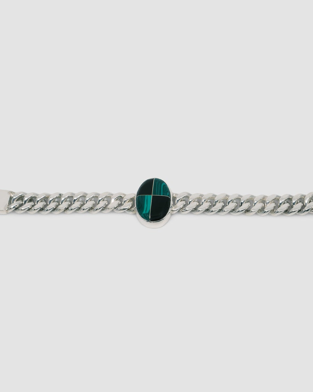 Silver cuban link chain with a chequerboard style inlaid stone which is green & black