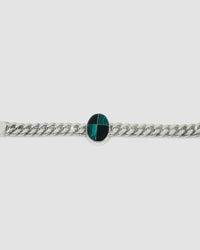Silver cuban link chain with a chequerboard style inlaid stone which is green & black