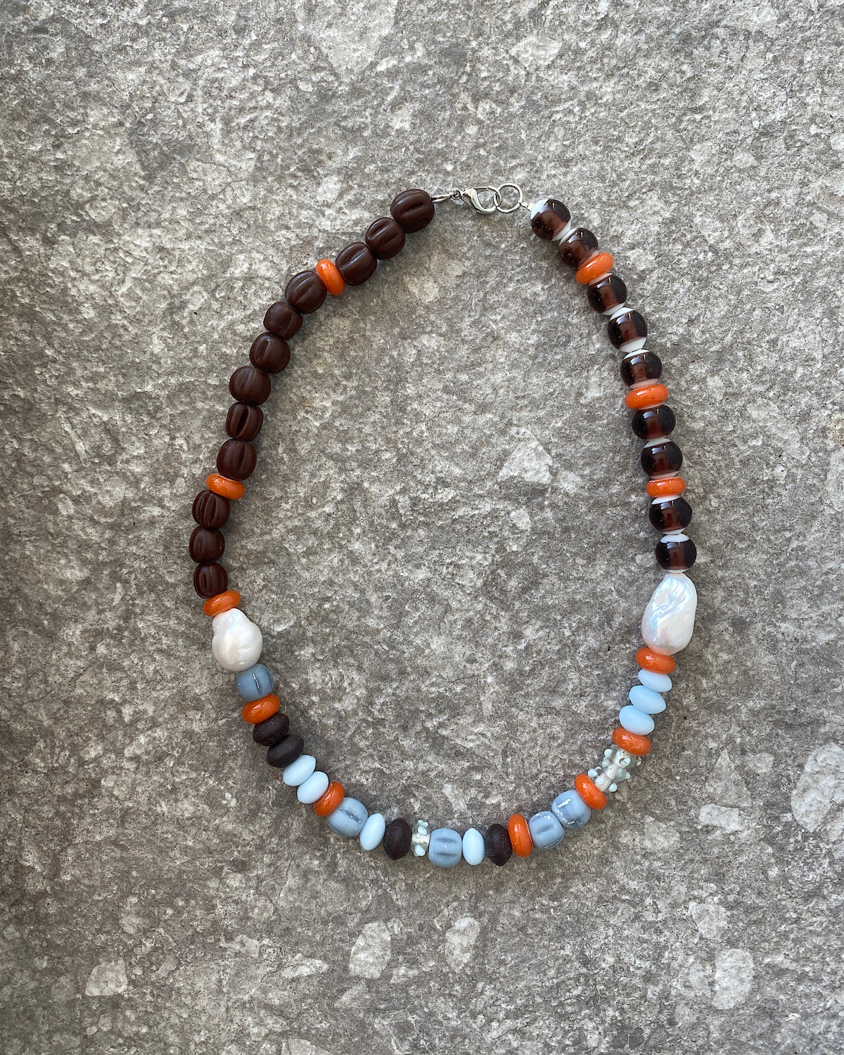 Earth toned assorted beaded glass and pearl necklace