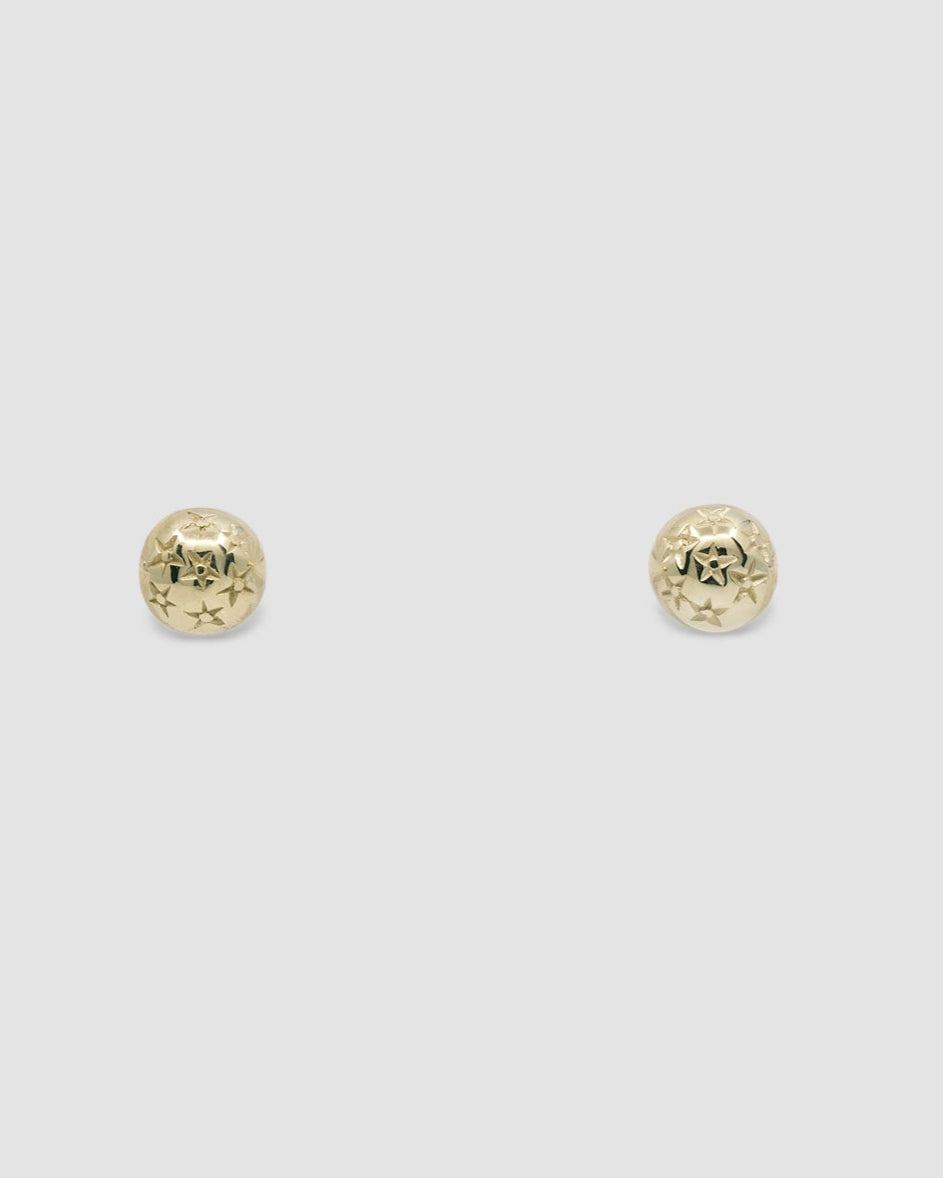very small gold star stamped dome stud earrings