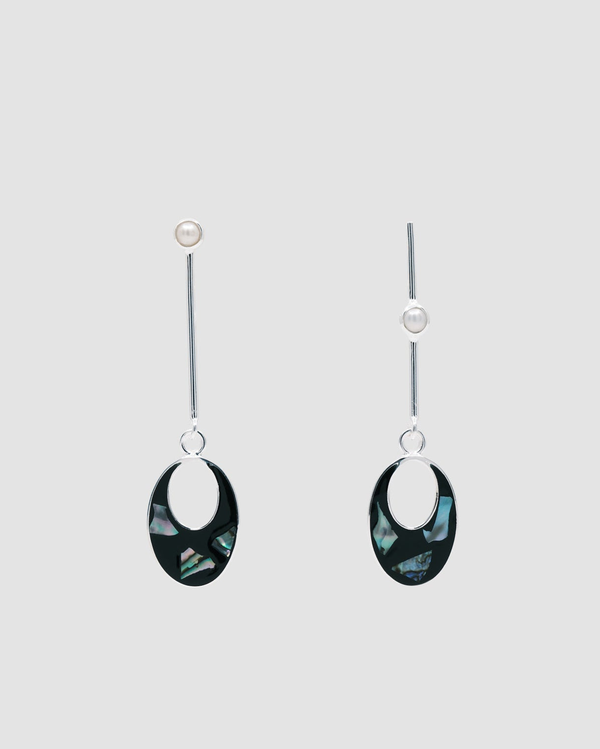 silver drop earrings with black and shell drop charms and odd pearls on the drop