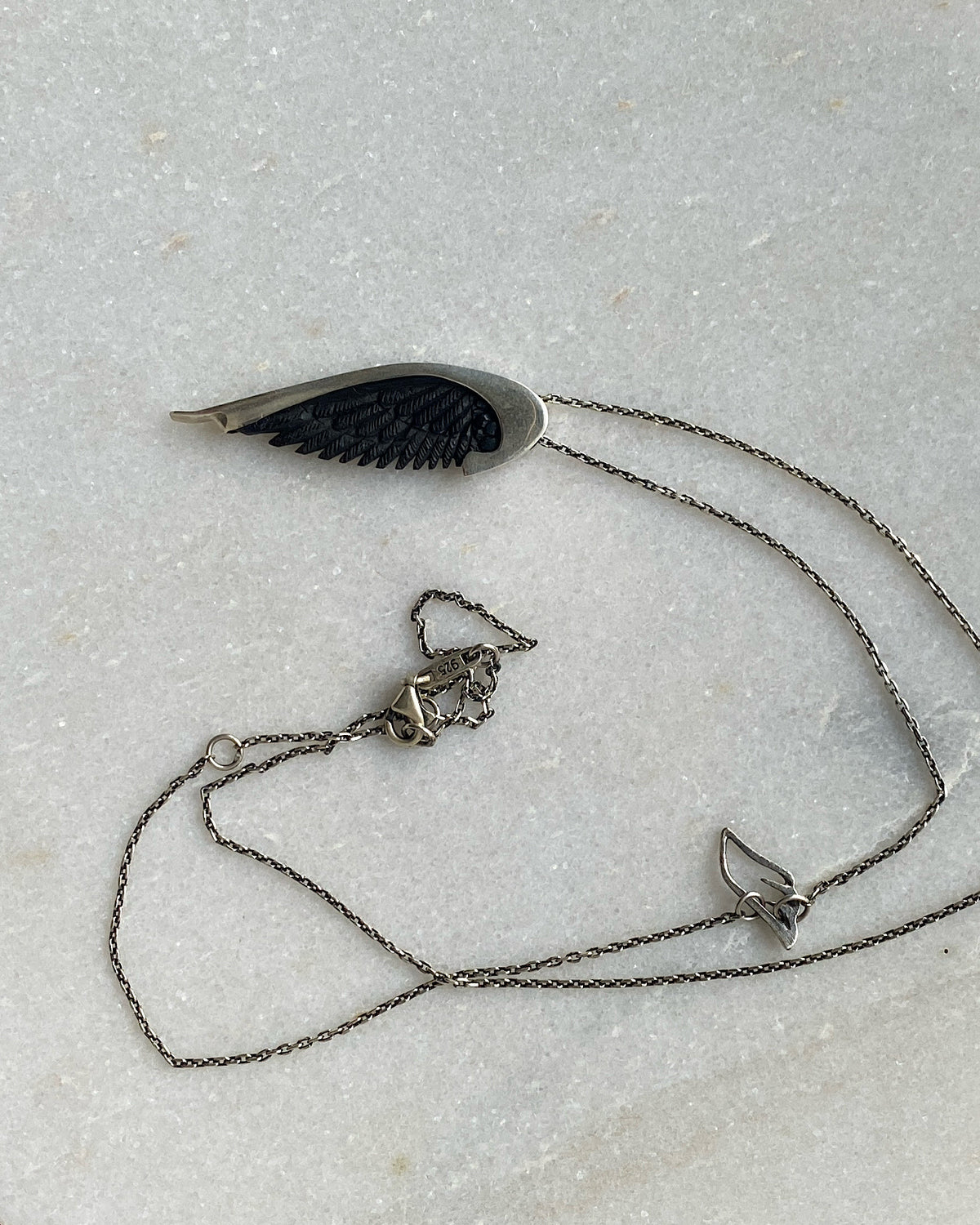 Silver and Black Carved horn wing chain Pendant by Johnny Ramli