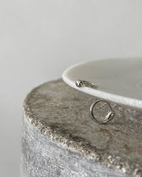 Silver organic Shaped Huggie earrings at The Pared Store, Surry Hills