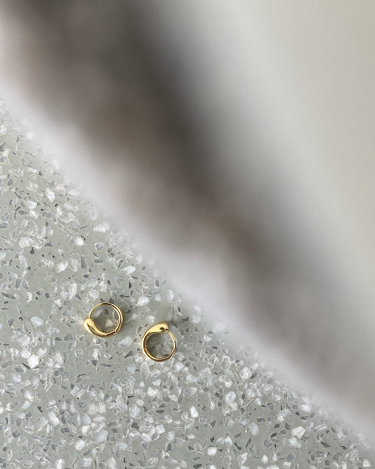 Small Gold huggies with a drip style