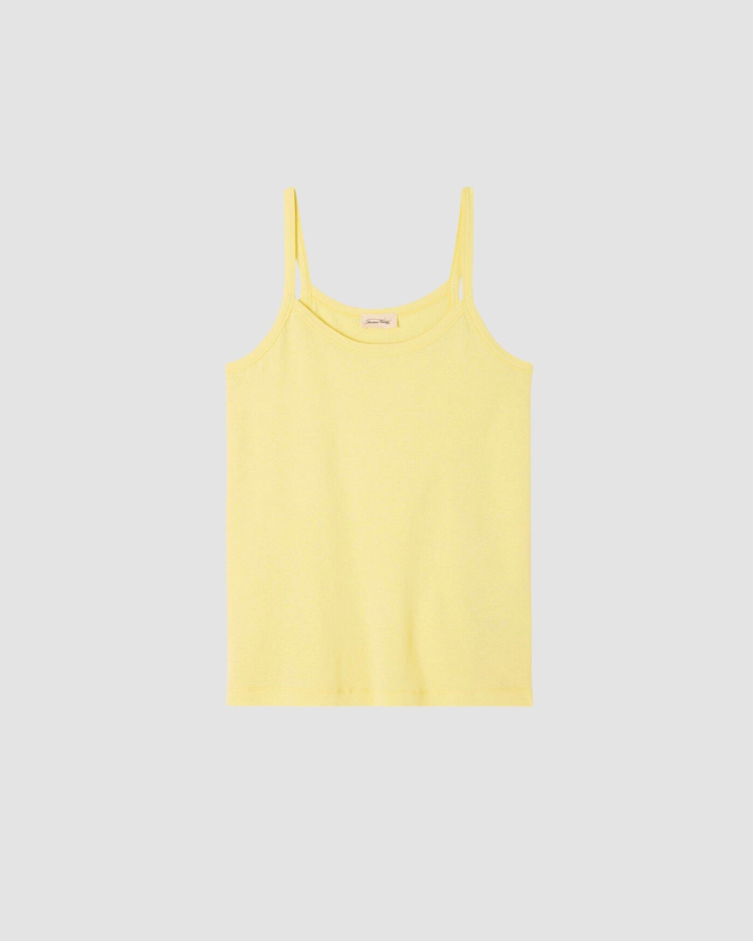 Model wears a pale yellow gamipy tank top