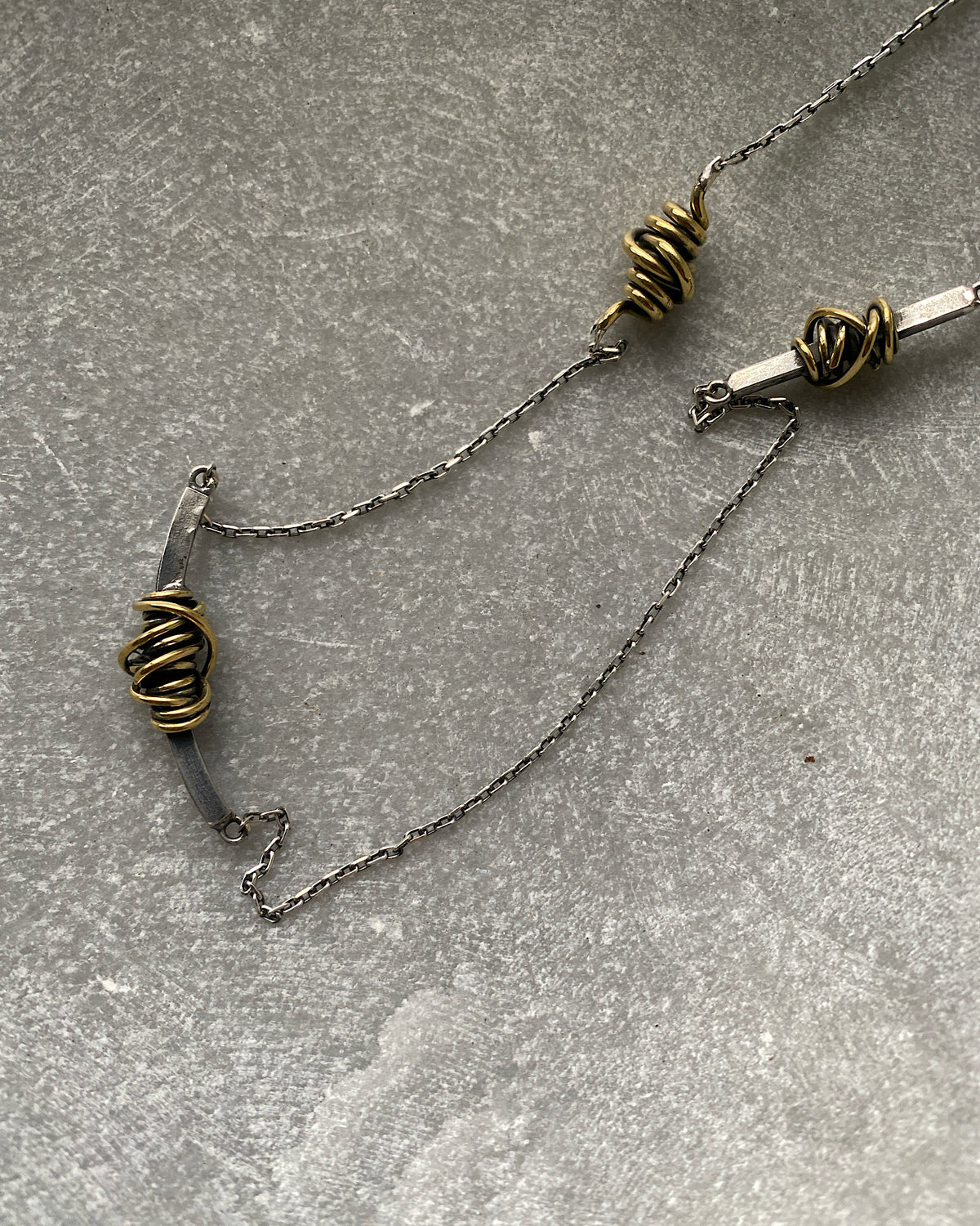 Silver silver necklace with Gold Swirl detail