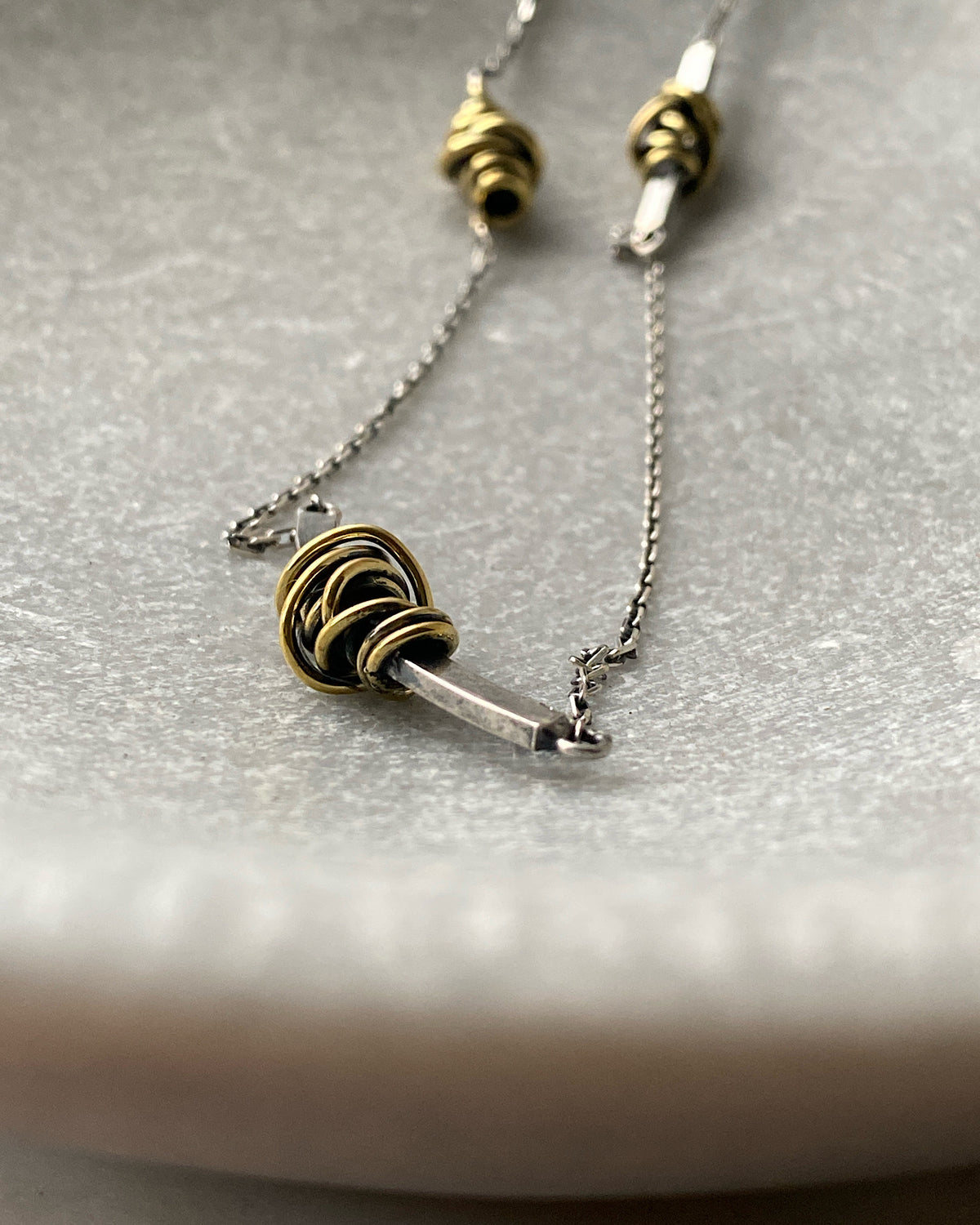 Silver silver necklace with Gold Swirl detail