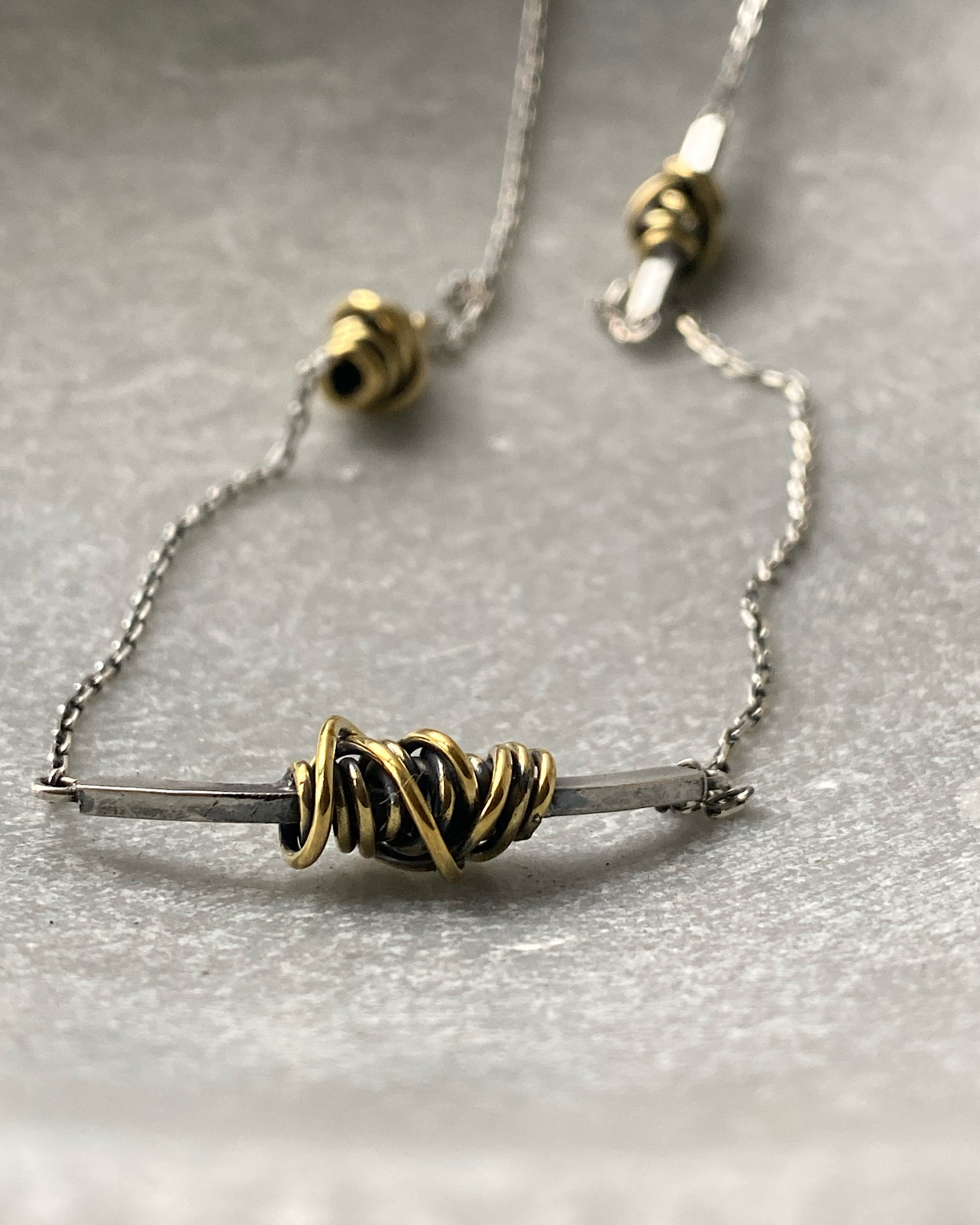 Silver silver necklace with Gold Swirl detail