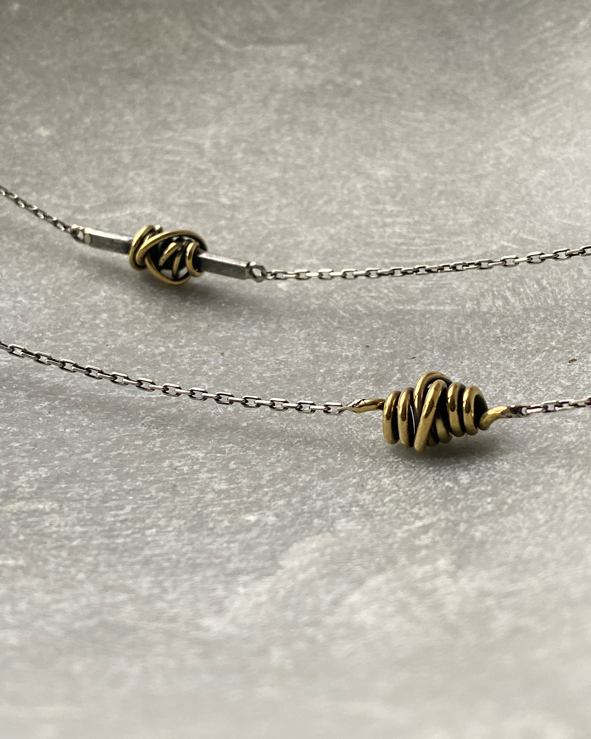 Silver silver necklace with Gold Swirl detail