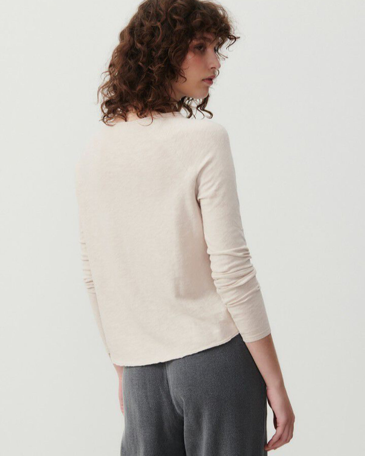 back view of a model wearing a beige coloured sonoma T-shirt