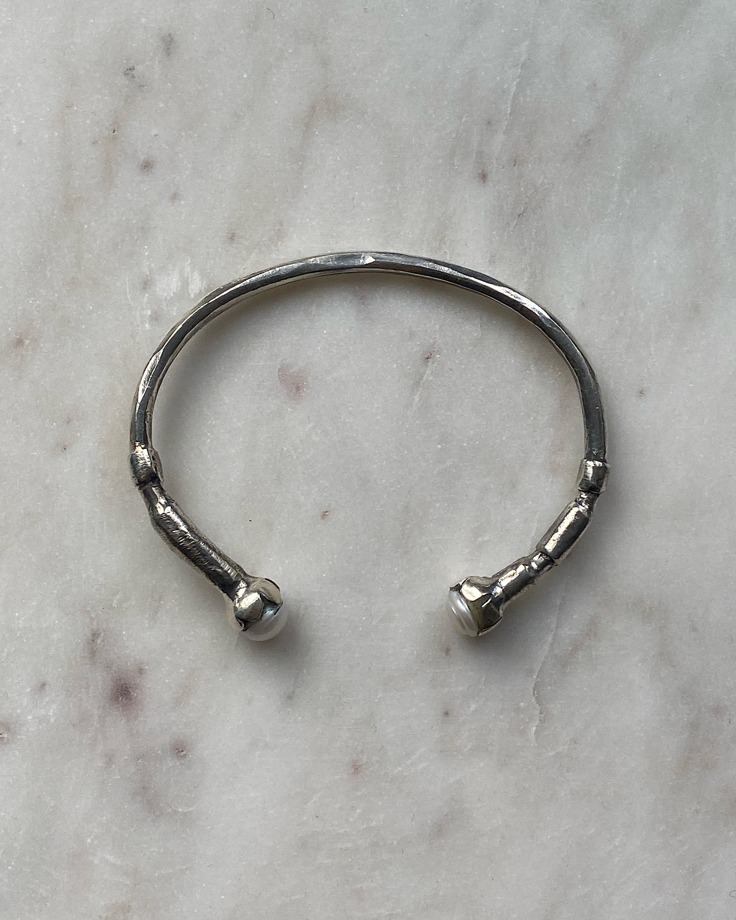 Silver cuff bracelet by Johnny Ramli, available at The Pared Store, Australia