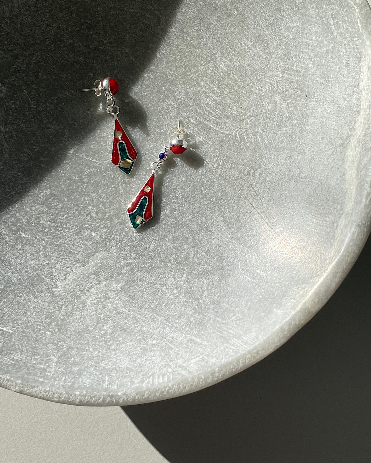 Red stud drop earrings featuring a upside down kite shaped charm with abalone and inlaid