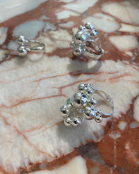 various silver cluster rings