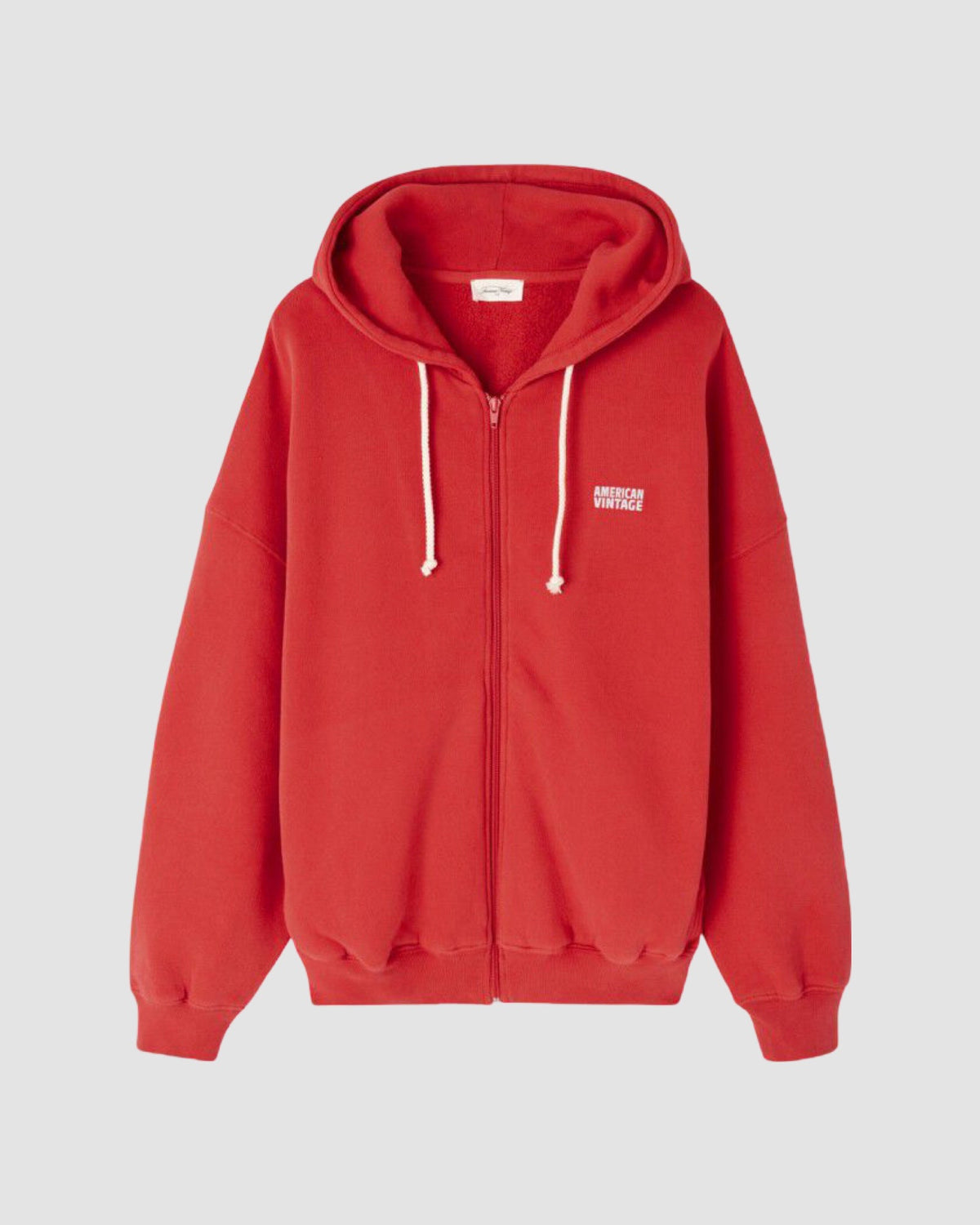 red hoodie with a zip, cream hood ties and a cream logo