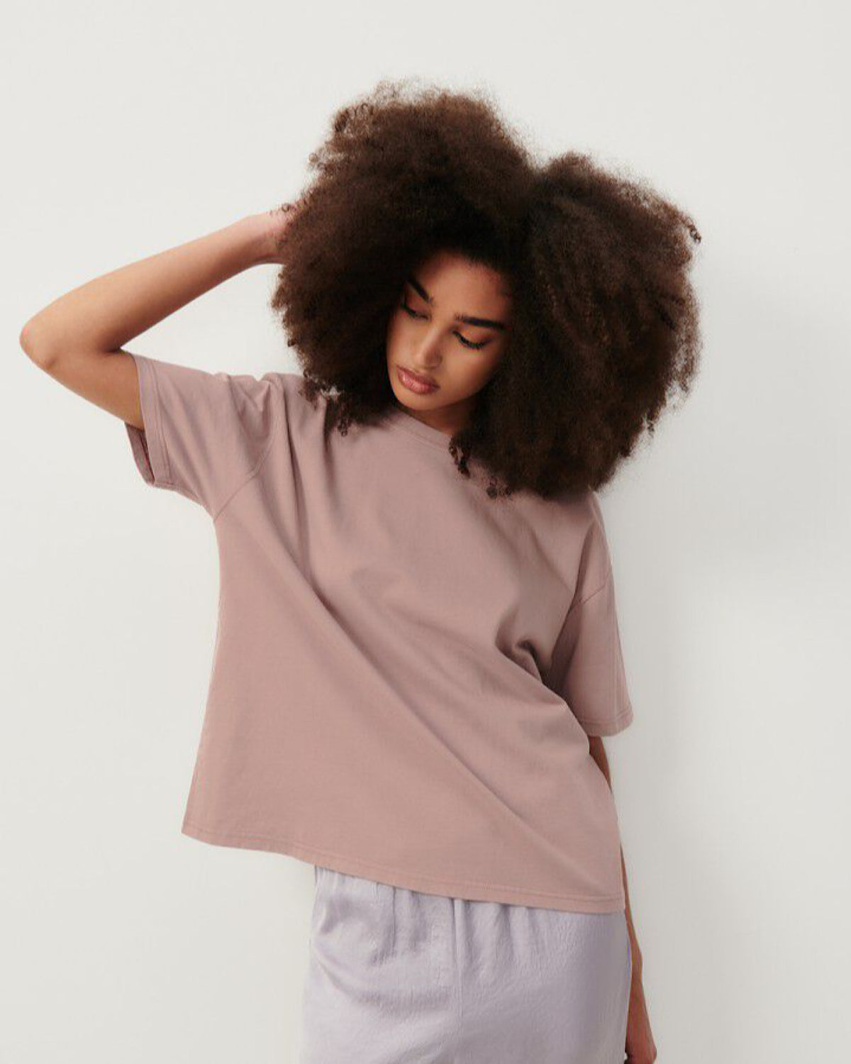 A boxy short sleeve dusty clay coloured round neck thick cotton t-shirt