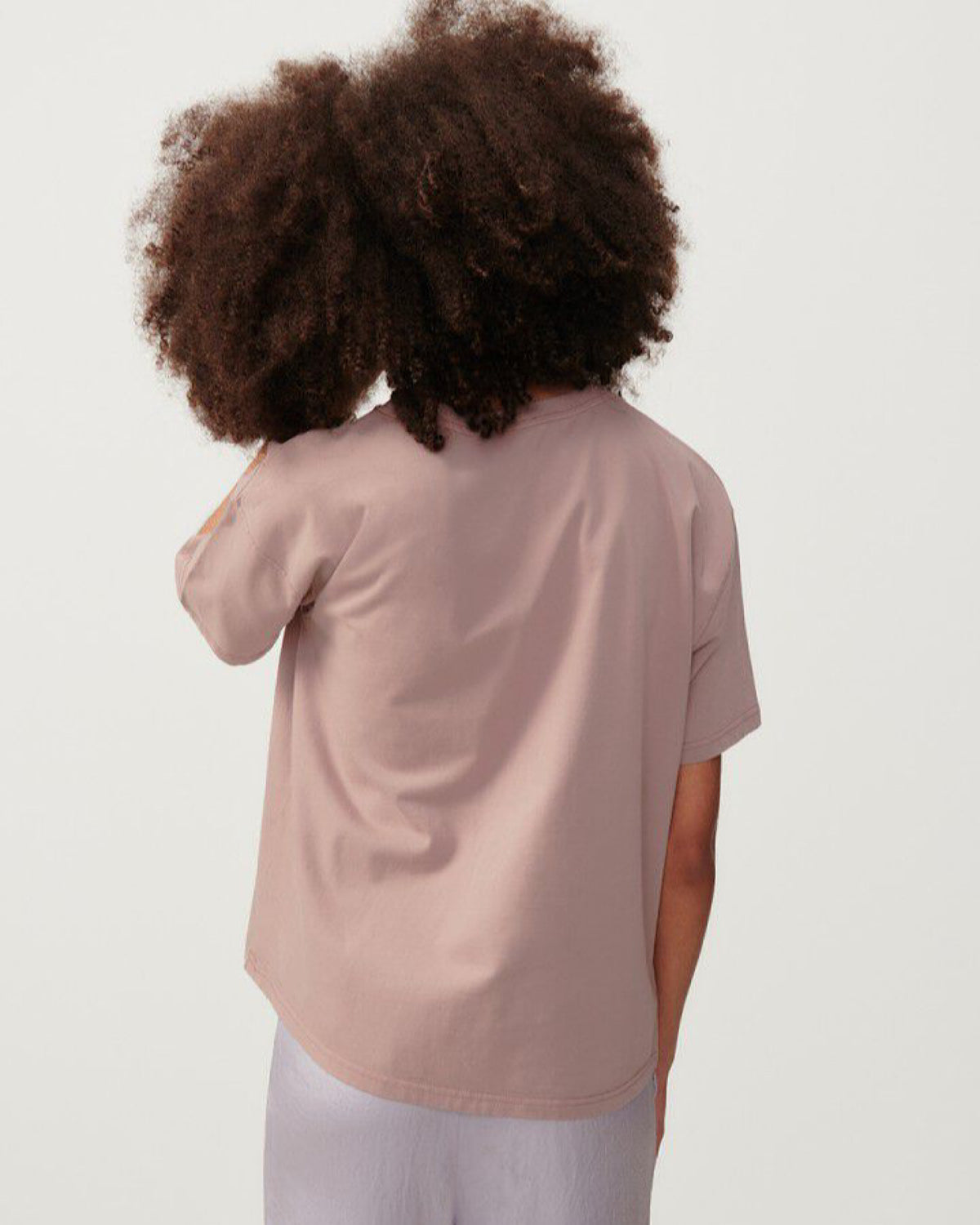 A boxy short sleeve dusty clay coloured round neck thick cotton t-shirt