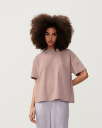 A boxy short sleeve dusty clay coloured round neck thick cotton t-shirt