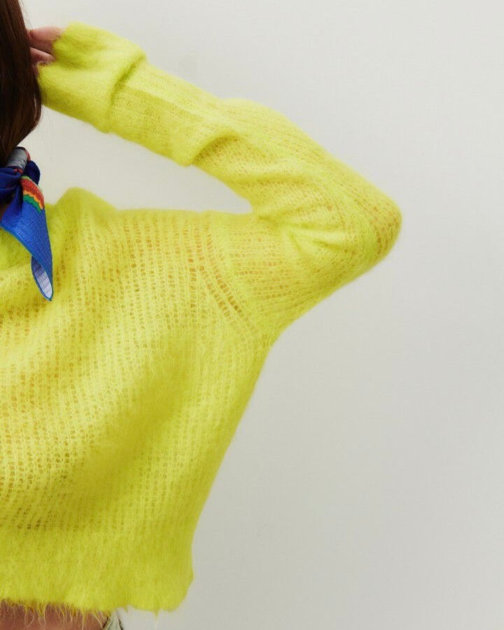 Detail of the open weave neon yellow Bymi Sweater by American Vintage available at The Pared Store