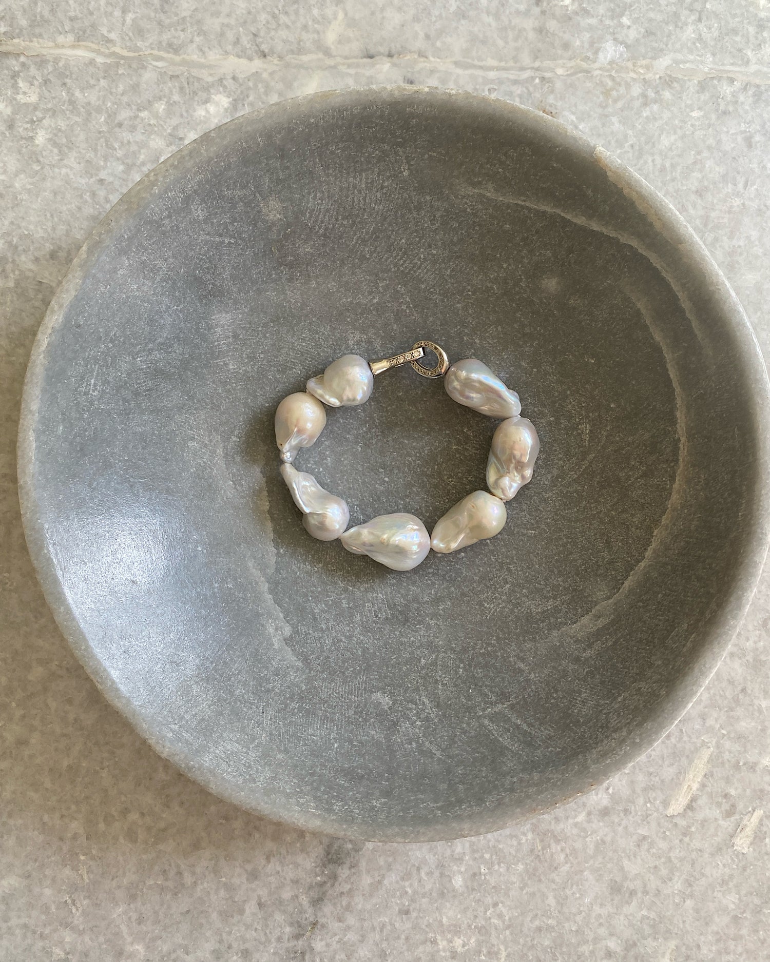 pearl bracelet in a bowl