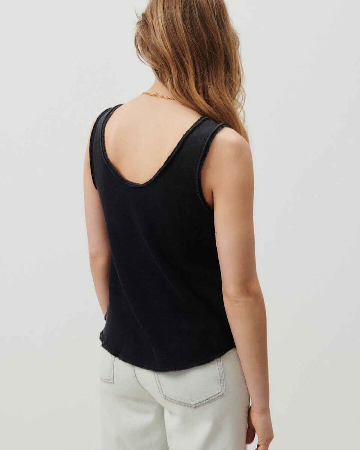 Model wears a black Sonoma Tank by American Vintage