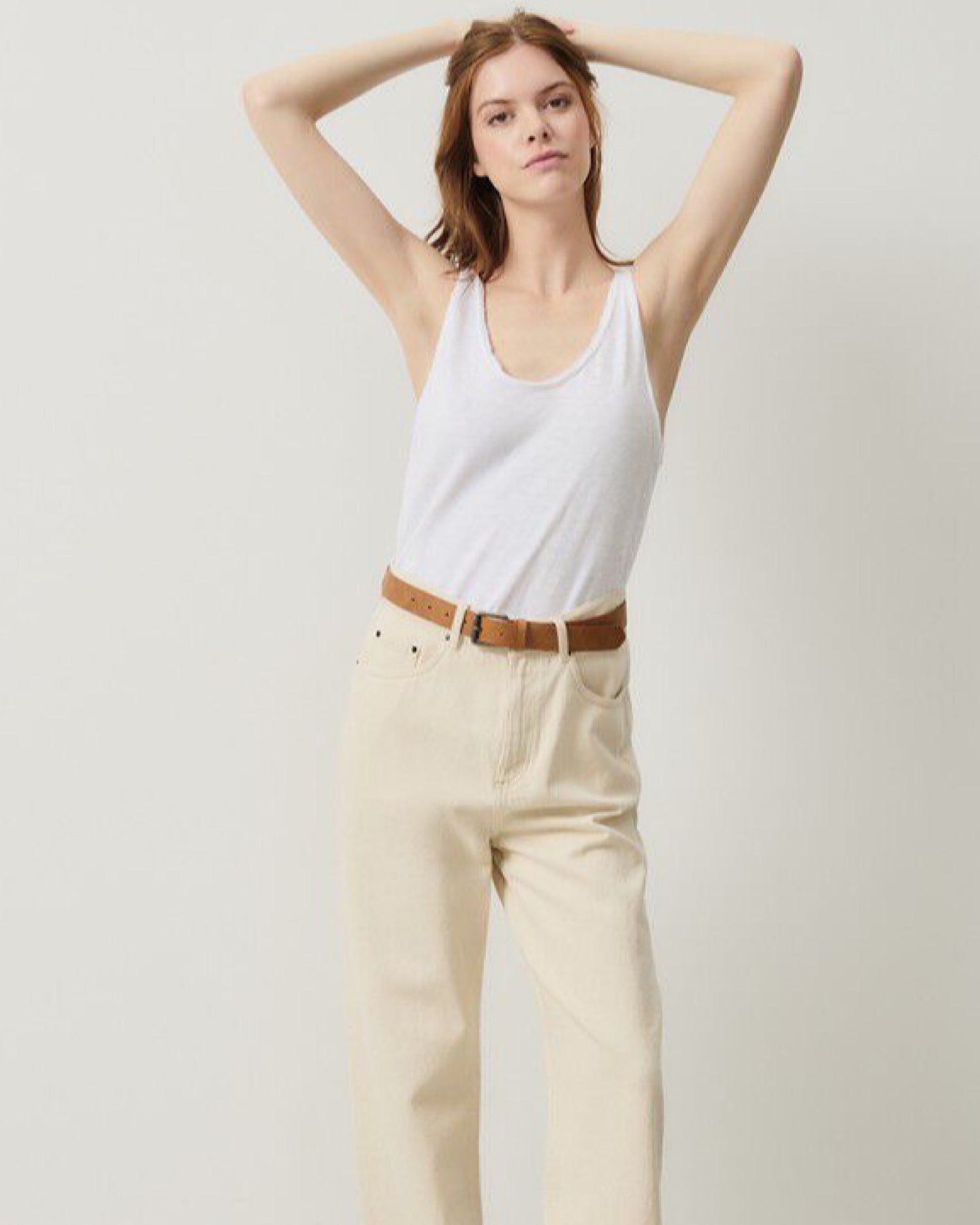 Model wears a Sonoma white tank  by American Vintage