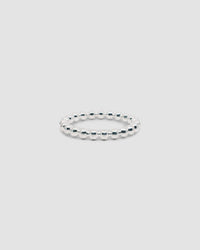 simple silver joined ball solid bracelet on grey background