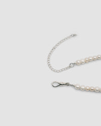 pearl necklace and its silver clasp and extension chain