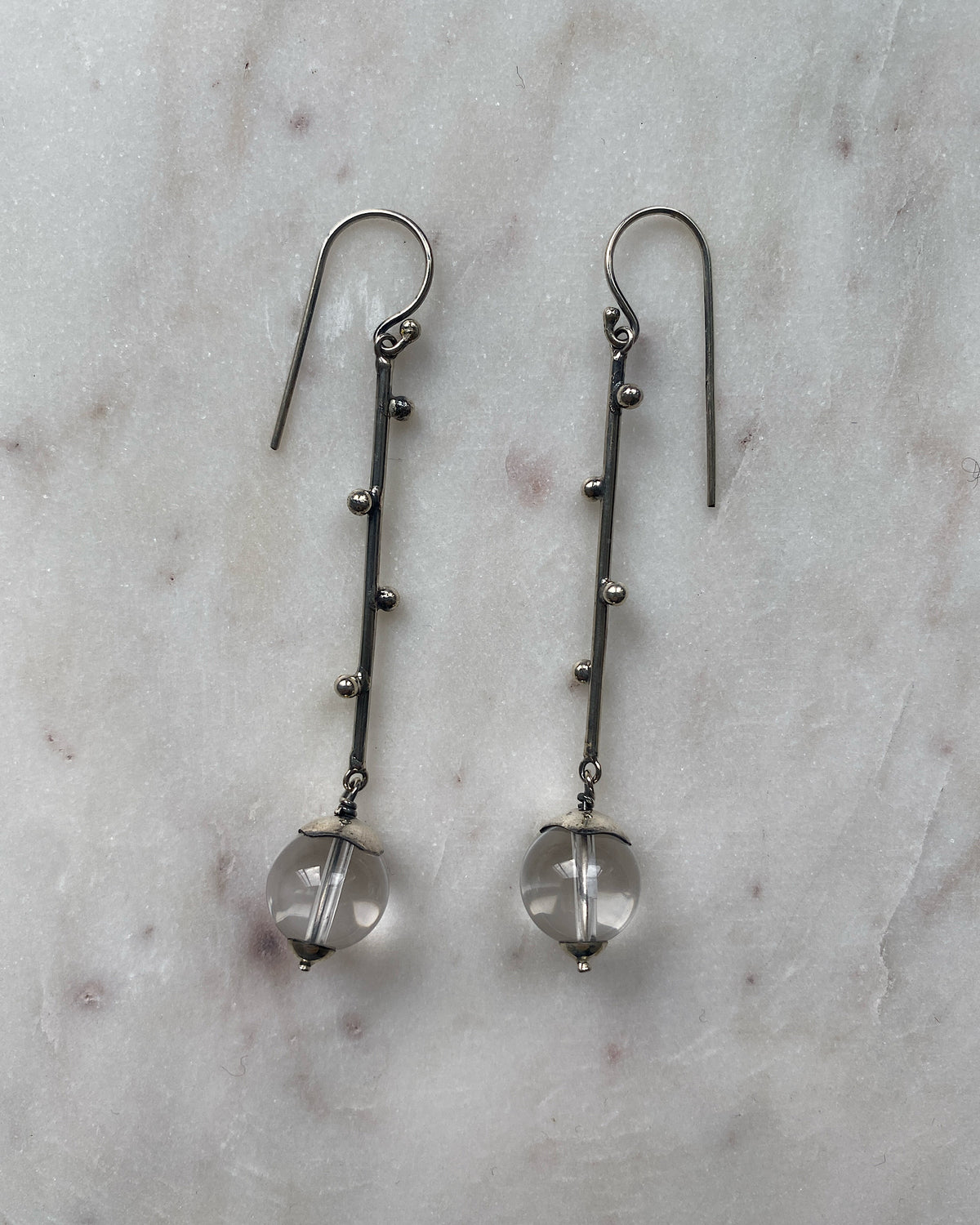 silver drop earrings from Johnny Ramli