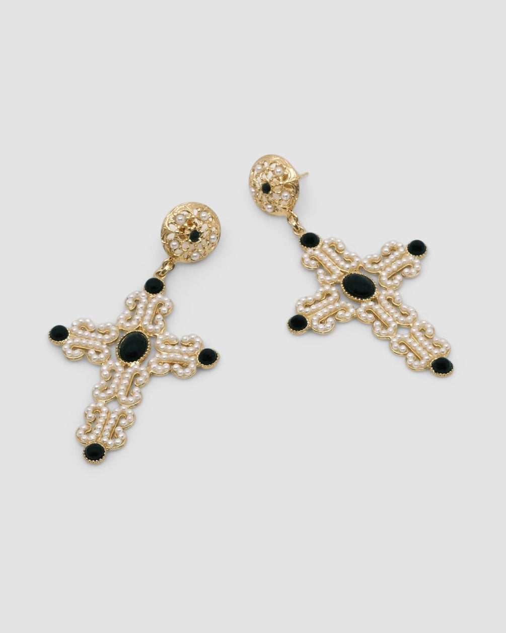 large pearl and onyx embellished gold cross intricate earrings