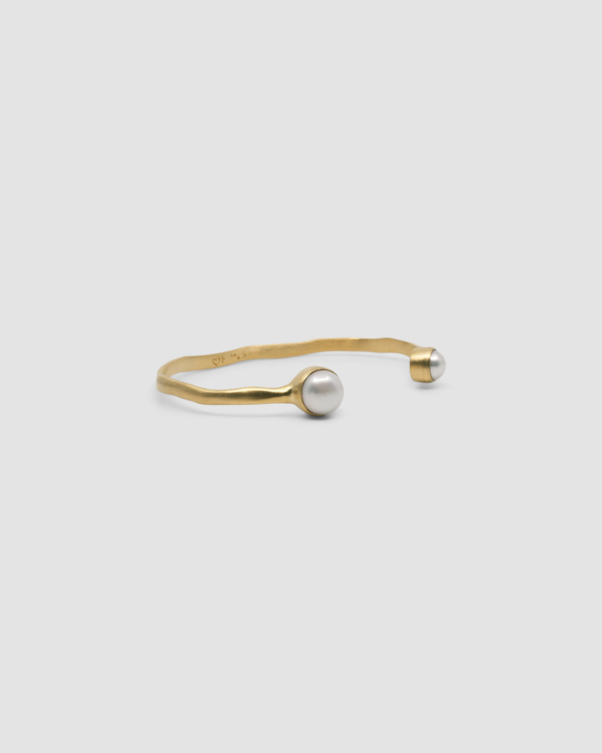 organic gold cuff bracelet with pearl ends