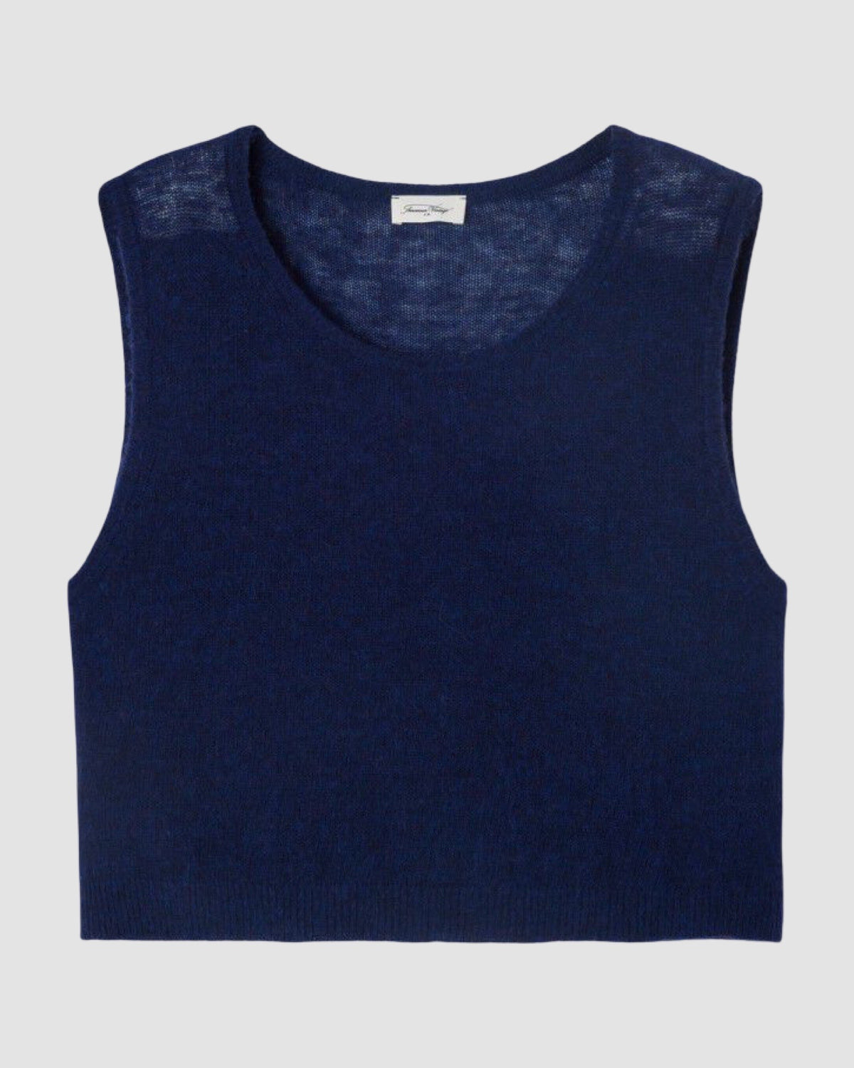 Navy blue sleeveless top on a light gray background