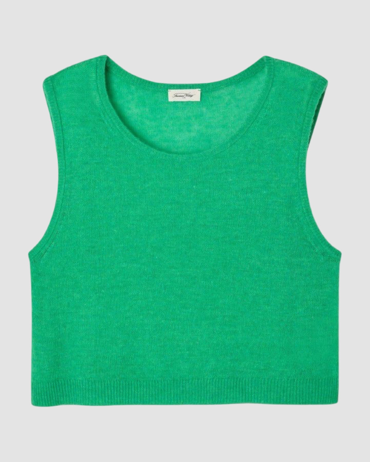 Green tank top on a light gray background