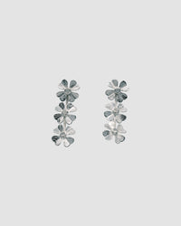 drop silver earrings featuring four leaf clover with a moonstone centre