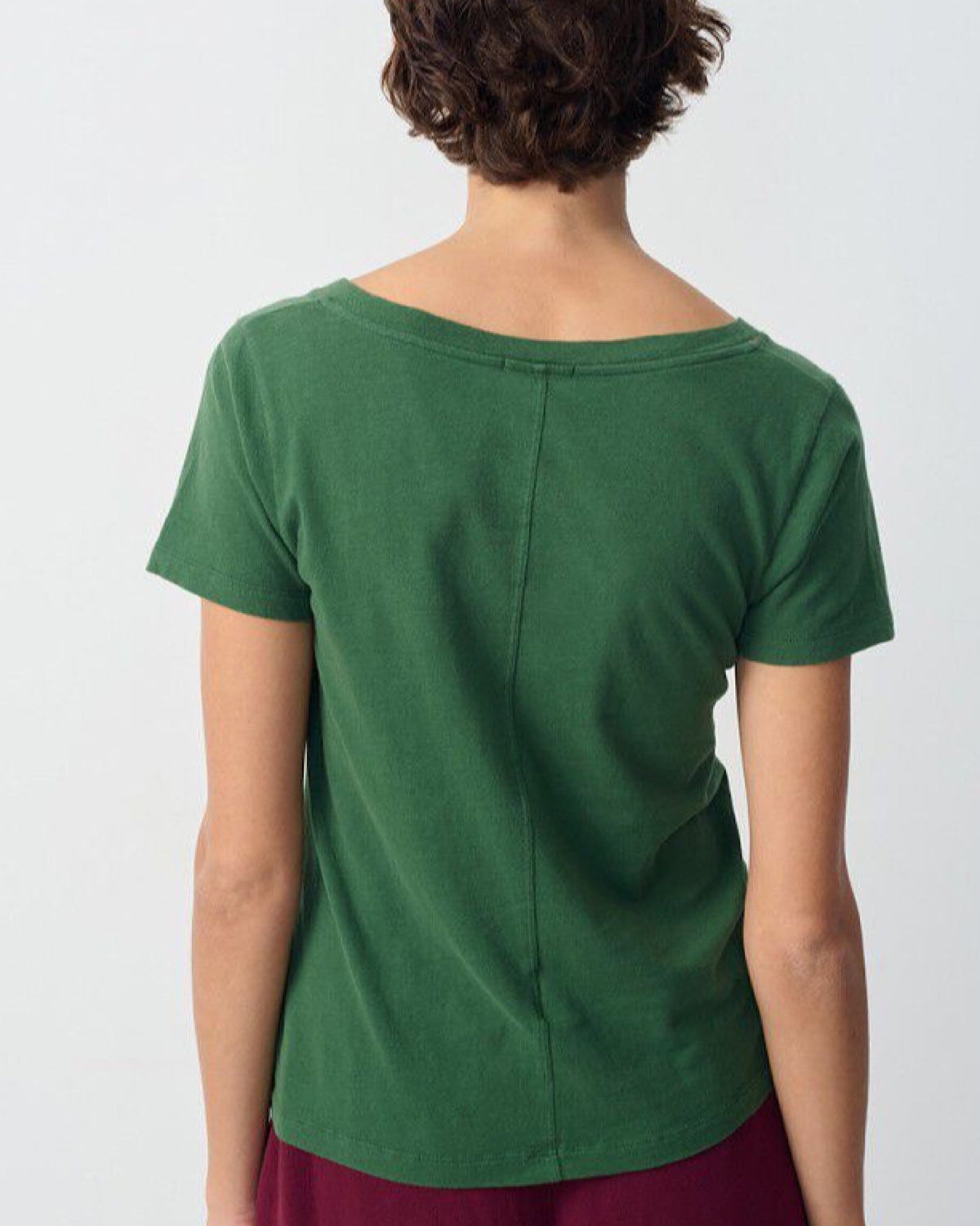 model wears a green tshirt