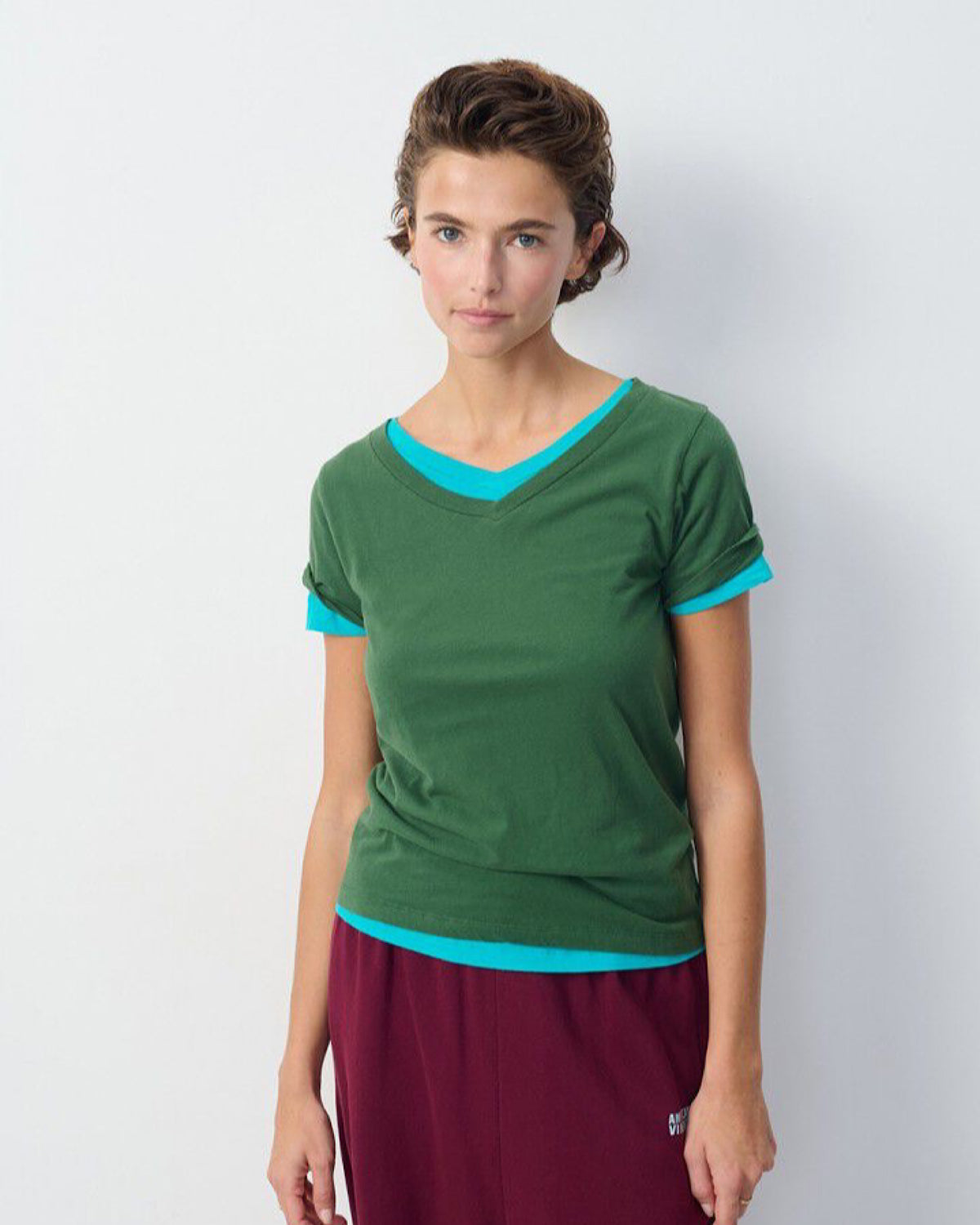 model wears layered gamipy tshirts