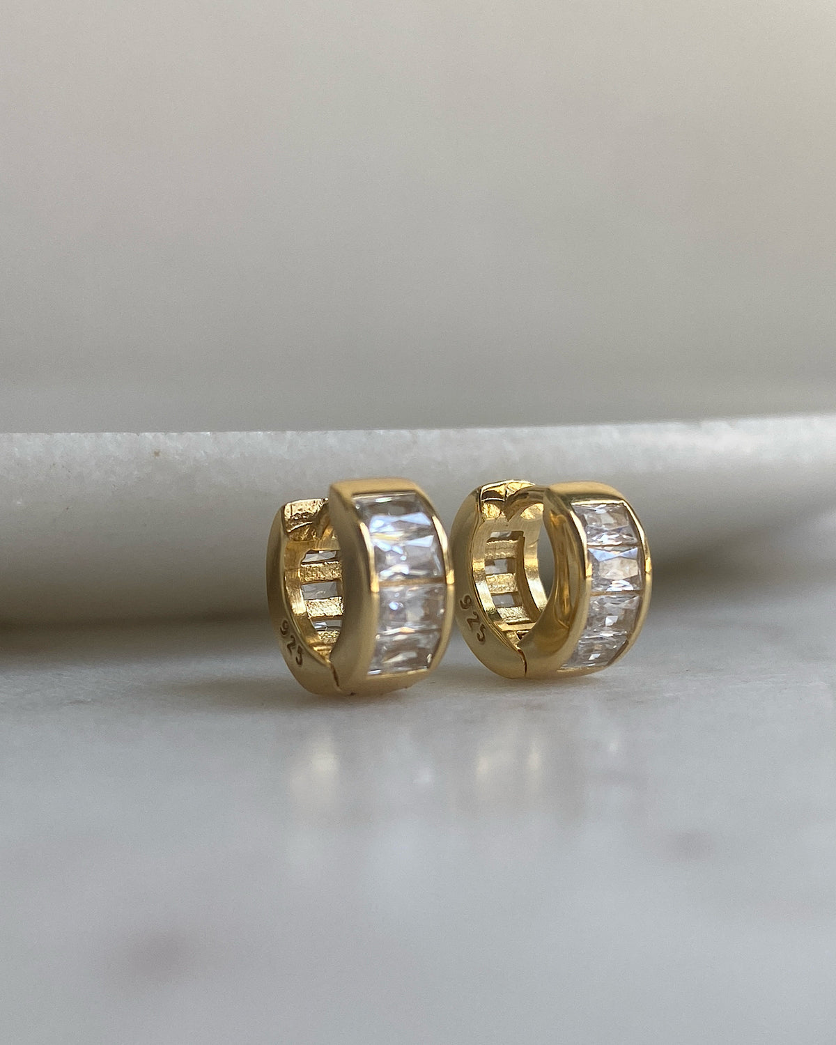 gold and crystal baguette huggies