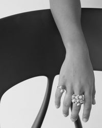 model wears a series of bubble rings