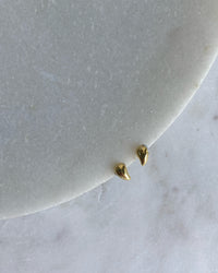 pair of gold bean shaped small studs