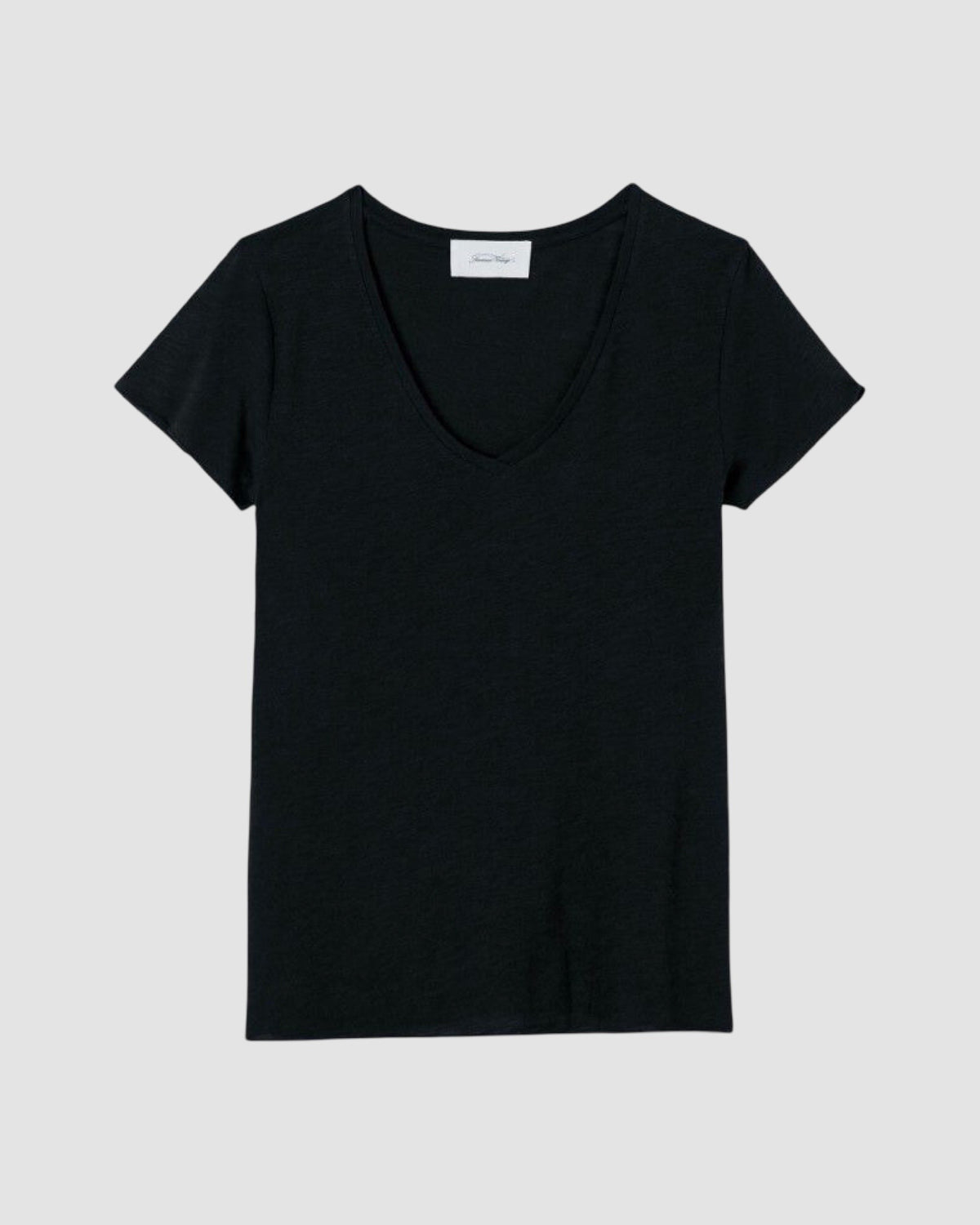 Black t-shirt on a light gray background