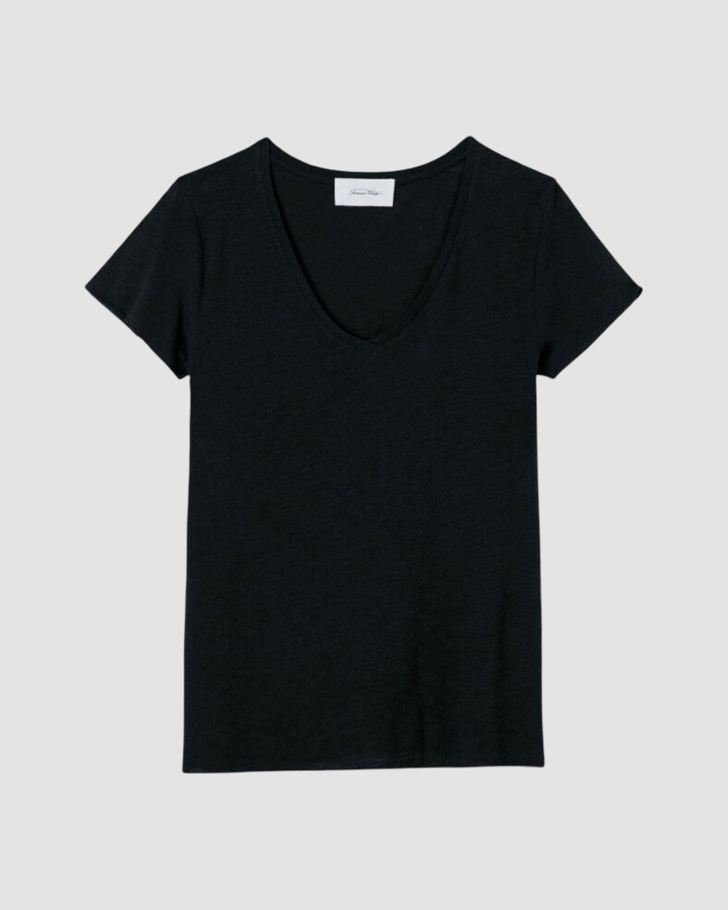 Black t-shirt on a light gray background